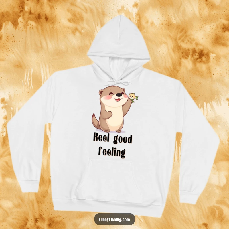 Funny otter hoodie showing a happy otter with tiny paws holding a small, smiling fish, symbolizing a small but mighty win.